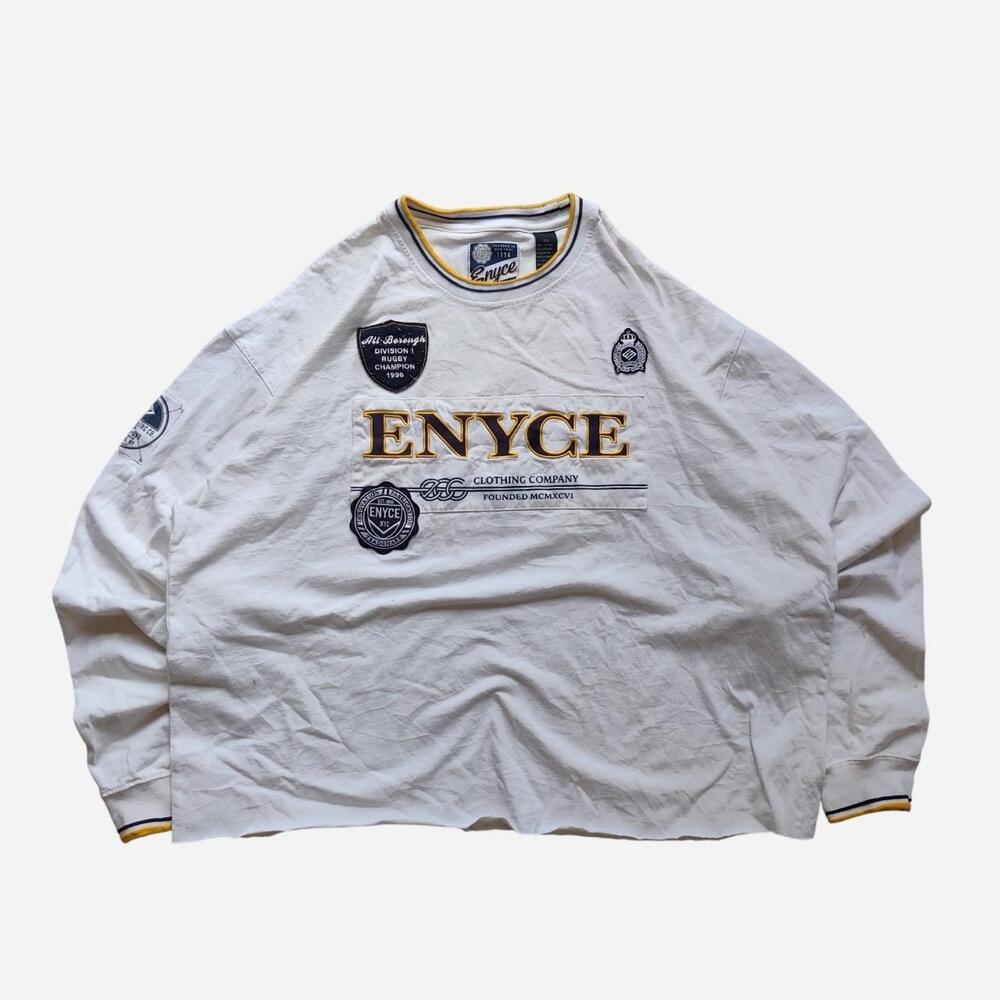 Y2K Enyce white long sleeve shirt with yellow and black accents